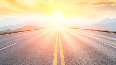 Road going into a sunset