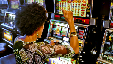 person at slot having fun