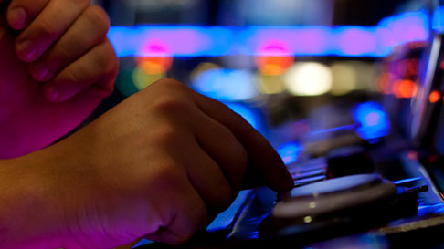 pushing the button on slot machine