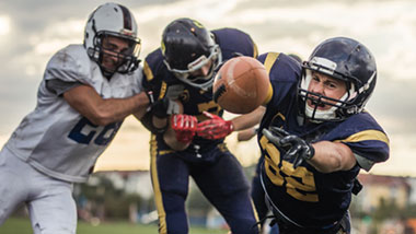 catching football
